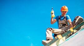 Roofing worker image from Heinz Roofing public site